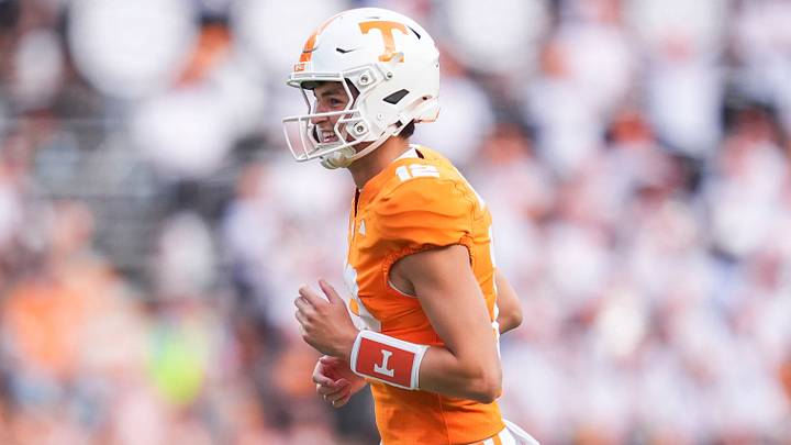 Tennessee quarterback George MacIntyre (12) smiles after he completes a touchdown pass during a Tennessee football game against Furman at Neyland Stadium in Knoxville, Tenn., on Sept. 5, 2026. Tennessee quarterback George MacIntyre (12) smiles after he completes a touchdown pass during a Tennessee football game against Furman at Neyland Stadium in Knoxville, Tenn., on Sept. 5, 2026.