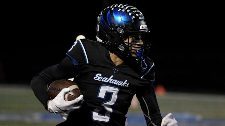 Decaturruns for a touchdown against North Caroline