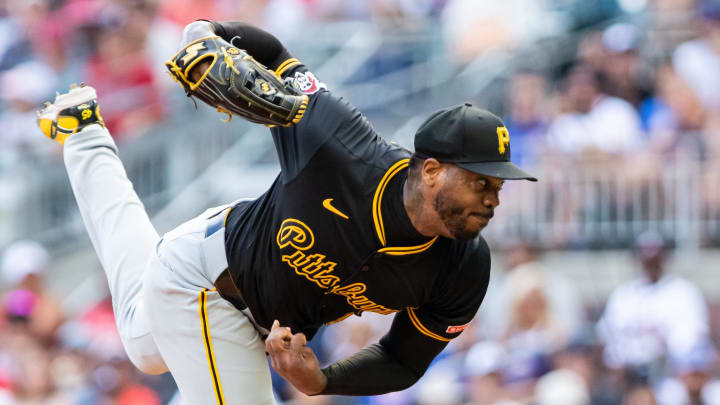 Jun 29, 2024; Cumberland, Georgia, USA; Pittsburgh Pirates pitcher Aroldis Chapman (45) pitches against the Atlanta Braves during the ninth inning at Truist Park. Mandatory Credit: Jordan Godfree-USA TODAY Sports