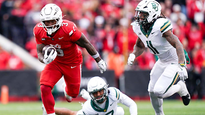 Cincinnati Bearcats running back Tawee Walker (3) runs the ball in the second quarter of a NCAA men’s football game between the Cincinnati Bearcats and Baylor Bears, Saturday, Oct. 25, 2025, at Nippert Stadium in Cincinnati.