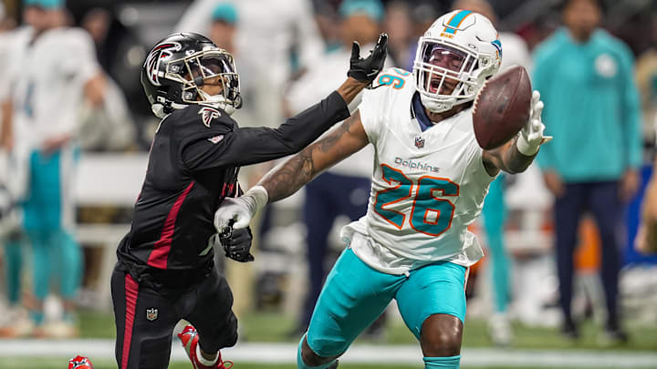 Oct 26, 2025; Atlanta, Georgia, USA; Miami Dolphins cornerback Rasul Douglas (26) is called for pass interference while defending Atlanta Falcons wide receiver Darnell Mooney (1) during the second half at Mercedes-Benz Stadium. Mandatory Credit: Dale Zanine-Imagn Images