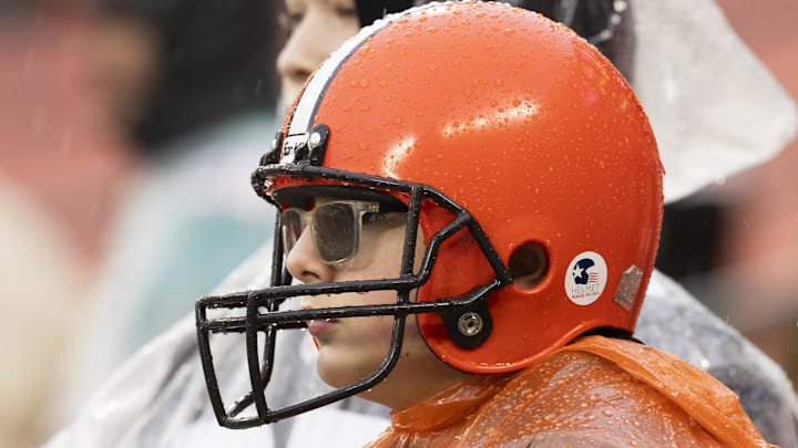 A Cleveland Browns fan watches warmups before the game against the Miami Dolphins at Huntington Bank Field.