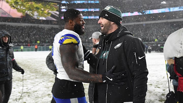 Jan 19, 2025; Philadelphia, Pennsylvania, USA; Los Angeles Rams linebacker Jared Verse (8) greets Philadelphia Eagles head coach Nick Sirianni (right) after the 2025 NFC divisional round game at Lincoln Financial Field. Mandatory Credit: Eric Hartline-Imagn Images