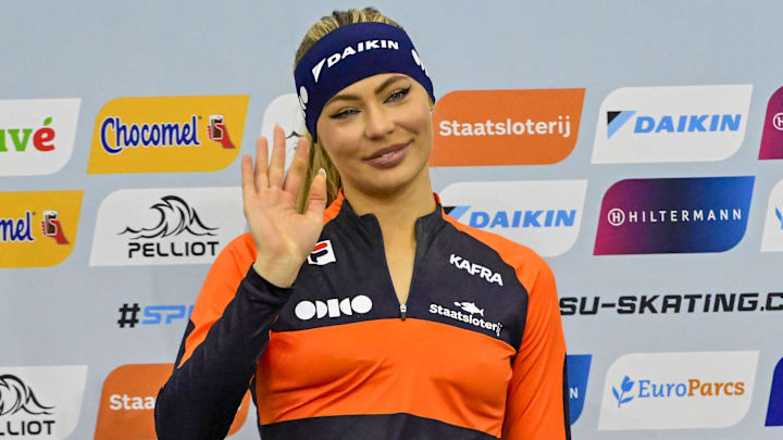 Nov 14, 2025; Kearns, Utah, UNITED STATES; Jutta Leerdam of the Netherlands receives the gold medal for the women’s 1000m during the ISU Speedskating World Cup at Utah Olympic Oval.