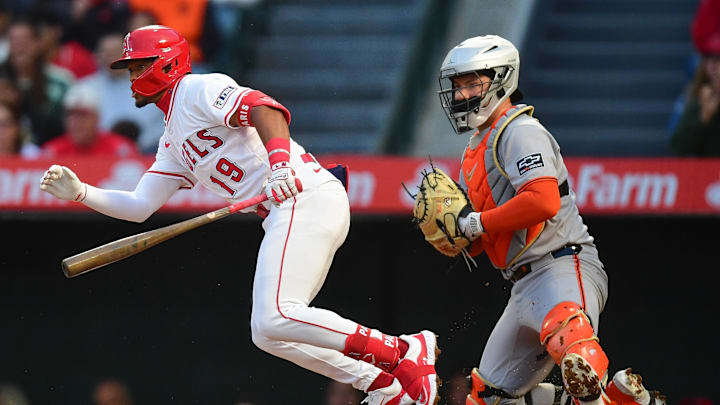 Apr 18, 2025; Anaheim, California, USA; Los Angeles Angels second baseman Kyren Paris (19) hits a single against the San Francisco Giants during the second inning at Angel Stadium. Mandatory Credit: Gary A. Vasquez-Imagn Images Apr 18, 2025; Anaheim, California, USA; Los Angeles Angels second baseman Kyren Paris (19) hits a single against the San Francisco Giants during the second inning at Angel Stadium. Mandatory Credit: Gary A. Vasquez-Imagn Images