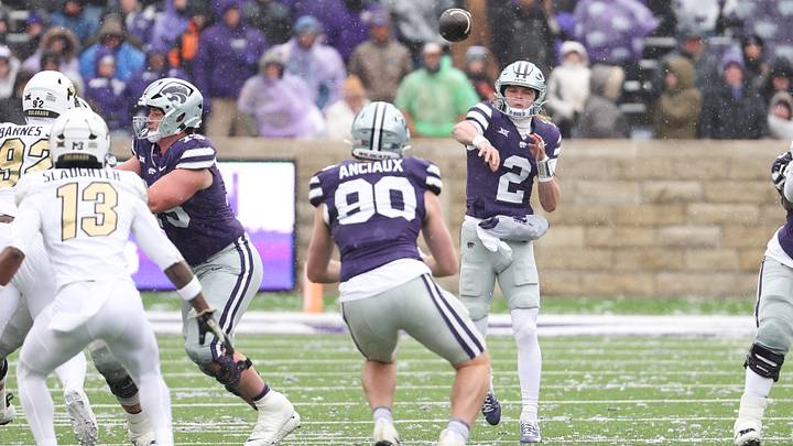 Nov 29, 2025; Manhattan, Kansas, USA; Kansas State Wildcats quarterback Avery Johnson (2) passes the ball to tight end Will Anciaux (80) during the first quarter against the Colorado Buffaloes at Bill Snyder Family Football Stadium. Mandatory Credit: Scott Sewell-Imagn Images Nov 29, 2025; Manhattan, Kansas, USA; Kansas State Wildcats quarterback Avery Johnson (2) passes the ball to tight end Will Anciaux (80) during the first quarter against the Colorado Buffaloes at Bill Snyder Family Football Stadium. Mandatory Credit: Scott Sewell-Imagn Images