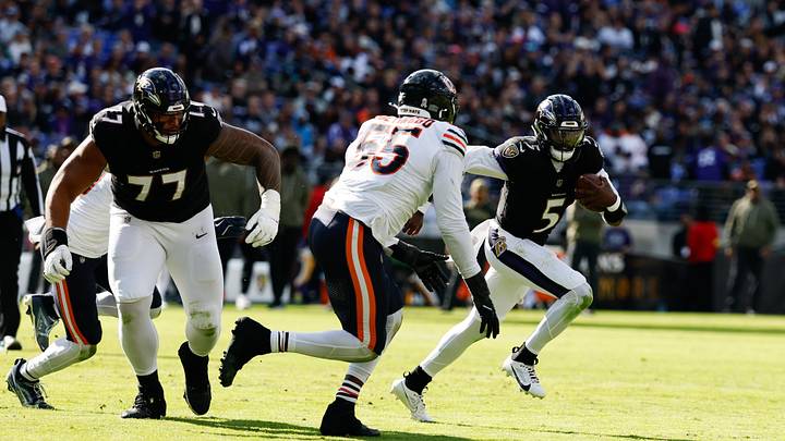 Baltimore Ravens quarterback Tyler Huntley and Chicago Bears defensive end Dayo Odeyingbo. Baltimore Ravens quarterback Tyler Huntley and Chicago Bears defensive end Dayo Odeyingbo.