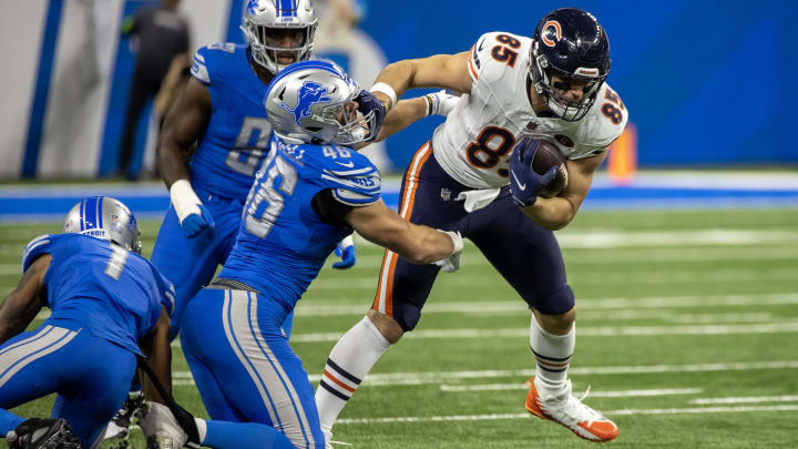 Bears tight end Cole Kmet breaks a tackle attempt from Lions linebacker Jack Campbell last season. Bears tight ends could have more room to rumble this year after catches. Bears tight end Cole Kmet breaks a tackle attempt from Lions linebacker Jack Campbell last season. Bears tight ends could have more room to rumble this year after catches.