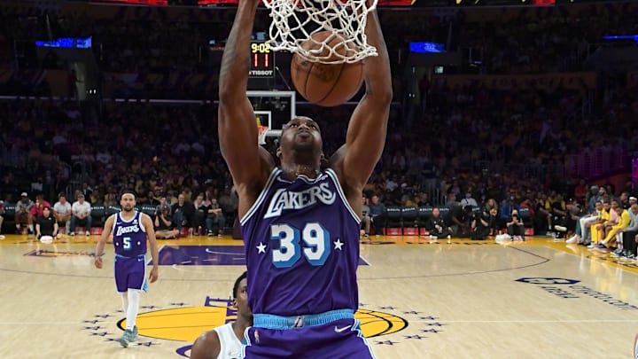 Apr 8, 2022; Los Angeles, California, USA;  Los Angeles Lakers center Dwight Howard (39) dunks the ball in the second half of the game against the Oklahoma City Thunder at Crypto.com Arena. Mandatory Credit: Jayne Kamin-Oncea-Imagn Images