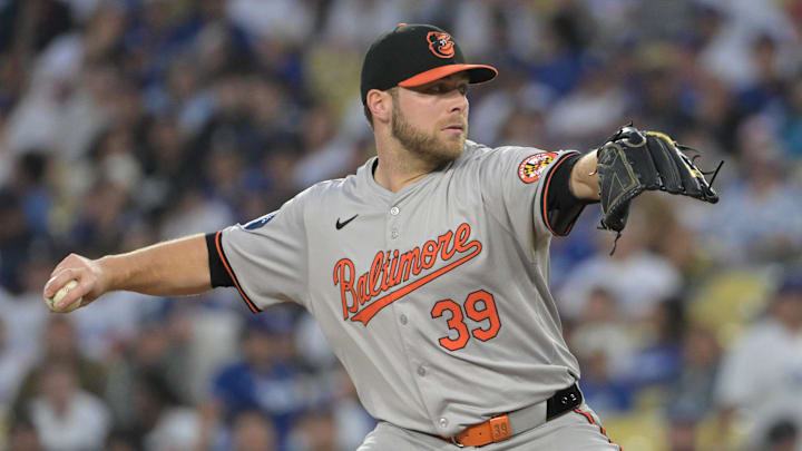 Aug 28, 2024; Los Angeles, California, USA;  Baltimore Orioles starting pitcher Corbin Burnes (39) delivers to the plate in the first inning against the Los Angeles Dodgers at Dodger Stadium.