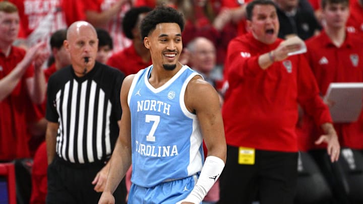 Feb 17, 2026; Raleigh, North Carolina, USA;  North Carolina Tar Heels guard Seth Trimble (7) reacts after scoring against the NC State Wolfpack during the first half at Lenovo Center. Mandatory Credit: Zachary Taft-Imagn Images