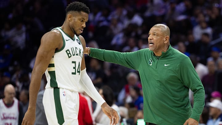 Oct 23, 2024; Philadelphia, Pennsylvania, USA; Milwaukee Bucks head coach Doc Rivers talks with forward Giannis Antetokounmpo (34) during the third quarter against the Philadelphia 76ers at Wells Fargo Center. Mandatory Credit: Bill Streicher-Imagn Images Oct 23, 2024; Philadelphia, Pennsylvania, USA; Milwaukee Bucks head coach Doc Rivers talks with forward Giannis Antetokounmpo (34) during the third quarter against the Philadelphia 76ers at Wells Fargo Center. Mandatory Credit: Bill Streicher-Imagn Images
