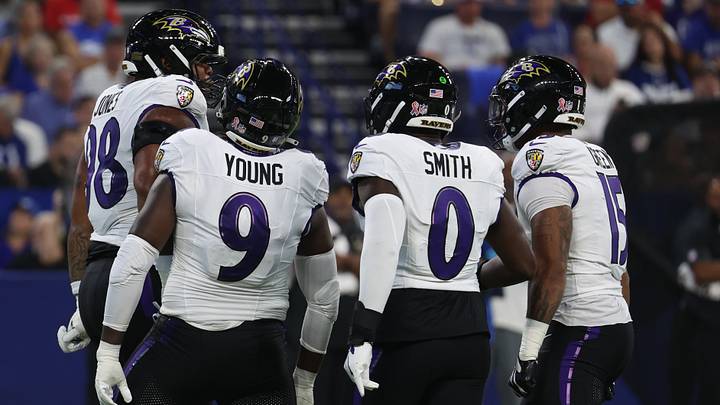 Sep 13, 2026; Indianapolis, Indiana, USA; Baltimore Ravens defensive line Travis Jones (98) and linebacker Zion Young (9) and linebacker Roquan Smith (0) and linebacker Mike Green (15) celebrate during the first quarter against the Indianapolis Colts at Lucas Oil Stadium. Mandatory Credit: Trevor Ruszkowski-Imagn Images Sep 13, 2026; Indianapolis, Indiana, USA; Baltimore Ravens defensive line Travis Jones (98) and linebacker Zion Young (9) and linebacker Roquan Smith (0) and linebacker Mike Green (15) celebrate during the first quarter against the Indianapolis Colts at Lucas Oil Stadium. Mandatory Credit: Trevor Ruszkowski-Imagn Images