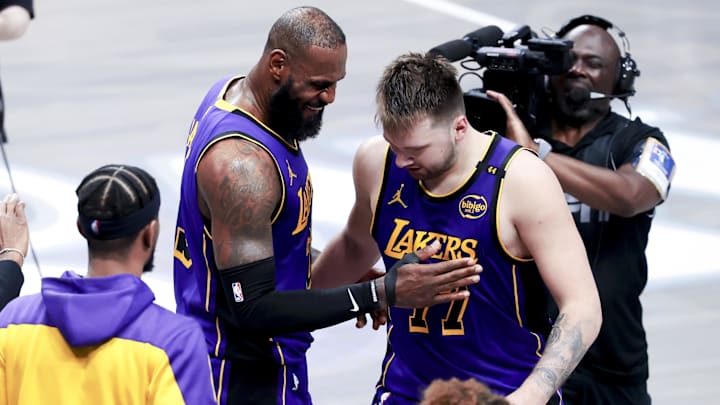 Apr 9, 2025; Dallas, Texas, USA: Los Angeles Lakers forward LeBron James (23) celebrates with Los Angeles Lakers guard Luka Doncic (77) during the fourth quarter against the Dallas Mavericks at American Airlines Center. Mandatory Credit: Kevin Jairaj-Imagn Images