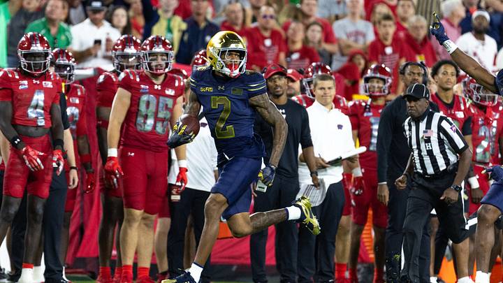 Sep 6, 2026; Green Bay, Wisconsin, USA;  Notre Dame Fighting Irish cornerback DJ McKinney (2) returns an interception at Lambeau Field.