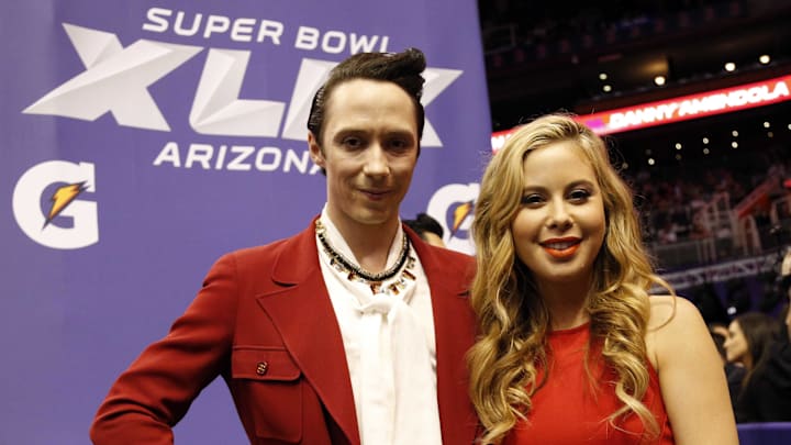 Tara Lipinski and Johnny Weir at Super Bowl media day for Super Bowl XLIX.