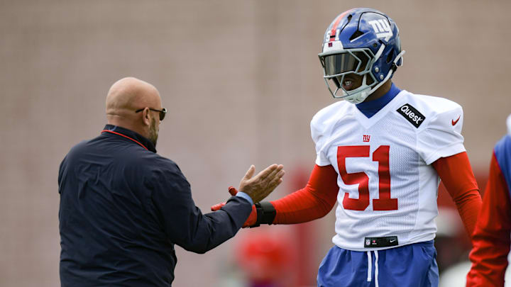 May 10, 2025; East Rutherford, NJ, USA; New York Giants head coach Brian Daboll greets linebacker Abdul Carter (51) during rookie minicamp at Quest Diagnostics Training Center. Mandatory Credit: John Jones-Imagn Images