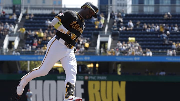 Pittsburgh Pirates designated hitter Andrew McCutchen (22) circles the bases on a solo home run against the Washington Nationals during the third inning at PNC Park. 