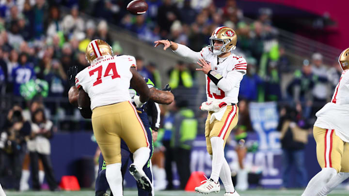 Jan 17, 2026; Seattle, WA, USA; San Francisco 49ers quarterback Brock Purdy (13) throws a pass against the Seattle Seahawks during the first half in an NFC Divisional Round game at Lumen Field. Mandatory Credit: Kevin Ng-Imagn Images Jan 17, 2026; Seattle, WA, USA; San Francisco 49ers quarterback Brock Purdy (13) throws a pass against the Seattle Seahawks during the first half in an NFC Divisional Round game at Lumen Field. Mandatory Credit: Kevin Ng-Imagn Images