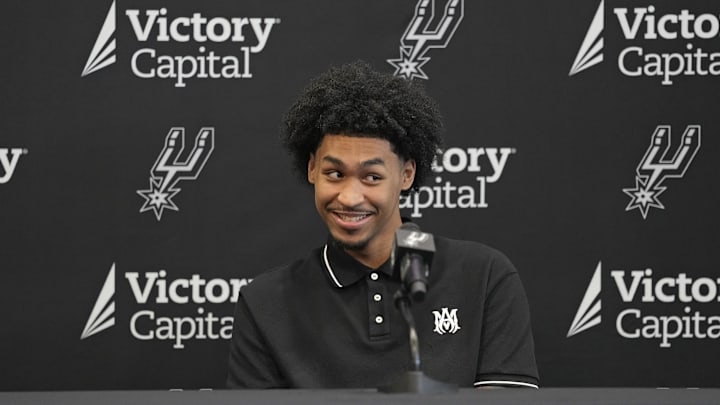 San Antonio first round draft pick Dylan Harper (2) reacts to a question from the media during a press conference at Victory Capital Performance Center. San Antonio first round draft pick Dylan Harper (2) reacts to a question from the media during a press conference at Victory Capital Performance Center.