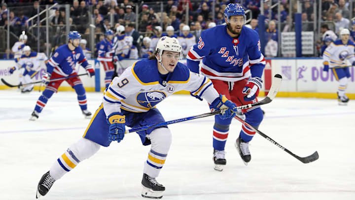 Nov 27, 2023; New York, New York, USA; Buffalo Sabres left wing Zach Benson (9) and New York Rangers