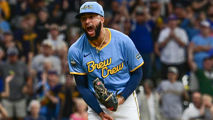 Sep 22, 2024; Milwaukee, Wisconsin, USA; Milwaukee Brewers pitcher Devin Williams (38) reacts after picking up a save in the ninth inning against the Arizona Diamondbacks at American Family Field. Mandatory Credit: Benny Sieu-Imagn Images