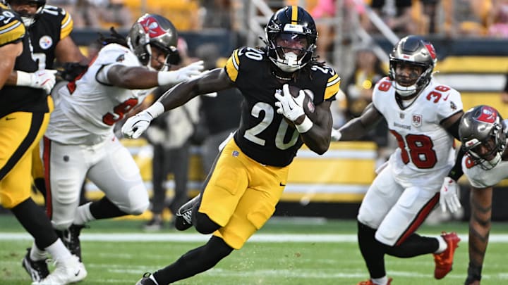 Aug 16, 2025; Pittsburgh, Pennsylvania, USA; Pittsburgh Steelers running back Kaleb Johnson (20) runs against the Tampa Bay Buccaneers during the second quarter at Acrisure Stadium. Mandatory Credit: Barry Reeger-Imagn Images Aug 16, 2025; Pittsburgh, Pennsylvania, USA; Pittsburgh Steelers running back Kaleb Johnson (20) runs against the Tampa Bay Buccaneers during the second quarter at Acrisure Stadium. Mandatory Credit: Barry Reeger-Imagn Images