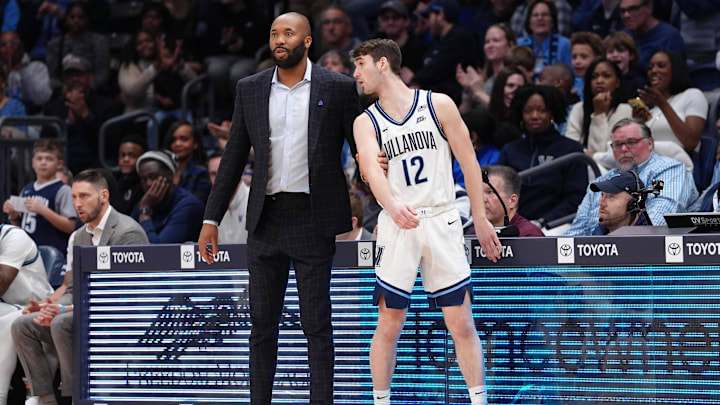 Villanova Wildcats head coach Kyle Neptune substitutes guard Collin O'Toole (12)