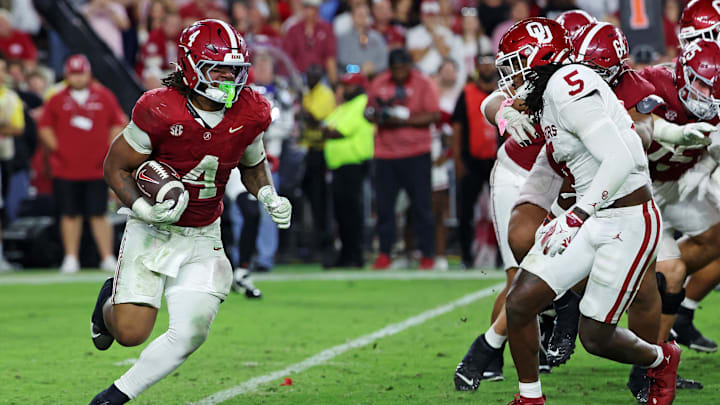 Nov 15, 2025; Tuscaloosa, Alabama, USA; Alabama Crimson Tide running back Daniel Hill (4) runs the ball against Oklahoma Sooners linebacker Kendal Daniels (5) during the fourth quarter. Nov 15, 2025; Tuscaloosa, Alabama, USA; Alabama Crimson Tide running back Daniel Hill (4) runs the ball against Oklahoma Sooners linebacker Kendal Daniels (5) during the fourth quarter.