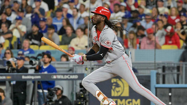 Oct 1, 2025; Los Angeles, California, USA; Cincinnati Reds shortstop Elly De La Cruz (44) watches after hitting the ball into play against the Los Angeles Dodgers in the fourth inning during game two of the Wildcard round for the 2025 MLB playoffs at Dodger Stadium. Mandatory Credit: Jayne Kamin-Oncea-Imagn Images