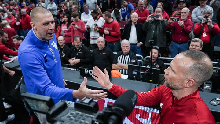Kentucky's Mark Pope and Louisville's Pat Kelsey greet each other before the Wildcats-Cardinals rivalry game in Louisville, Kentucky. Nov. 12, 2025 Kentucky's Mark Pope and Louisville's Pat Kelsey greet each other before the Wildcats-Cardinals rivalry game in Louisville, Kentucky. Nov. 12, 2025
