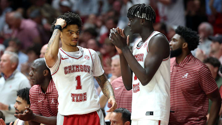Alabama Crimson Tide guard Jalil Bethea (1) and Alabama Crimson Tide forward Taylor Bol Bowen (7) react from the sideline during the first half against the Auburn Tigers at Coleman Coliseum. 