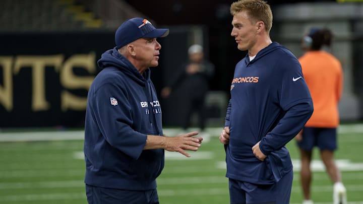 Denver Broncos head coach Sean Payton talks to Denver Broncos quarterback Bo Nix (10) before a game against the New Orleans Saints at Caesars Superdome. Denver Broncos head coach Sean Payton talks to Denver Broncos quarterback Bo Nix (10) before a game against the New Orleans Saints at Caesars Superdome.