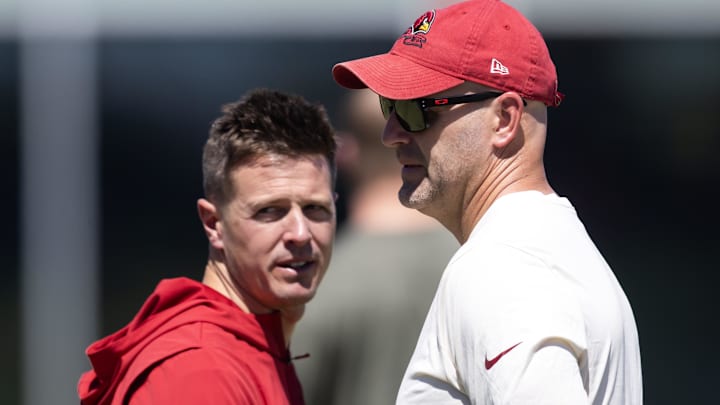 May 8, 2026; Tempe, AZ, USA; Arizona Cardinals head coach Mike LaFleur (left) with general manager Monti Ossenfort during rookie minicamp at Dignity Health Arizona Cardinals Training Center. Mandatory Credit: Mark J. Rebilas-Imagn Images