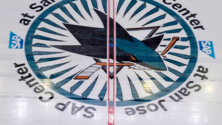 Oct 1, 2025; San Jose, California, USA; The San Jose Sharks logo at center ice commemorating the 35th anniversary season before a preseason game between the San Jose Sharks and the Anaheim Ducks at SAP Center at San Jose. 