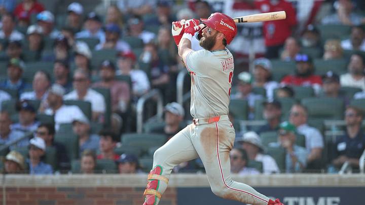 Sep 30, 2026; Cumberland, Georgia, USA;  Philadelphia Phillies outfielder Bryce Harper (3) hits a solo home run against the Atlanta Braves in the eighth inning during game two of the Wildcard round for the 2026 MLB Playoffs at Truist Park.  Mandatory Credit: Brett Davis-Imagn Images