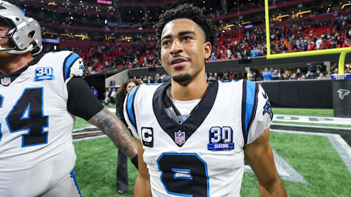 Jan 5, 2025; Atlanta, Georgia, USA; Carolina Panthers quarterback Bryce Young (9) celebrates with teammates after a victory over the Atlanta Falcons in overtime at Mercedes-Benz Stadium. Mandatory Credit: Brett Davis-Imagn Images Jan 5, 2025; Atlanta, Georgia, USA; Carolina Panthers quarterback Bryce Young (9) celebrates with teammates after a victory over the Atlanta Falcons in overtime at Mercedes-Benz Stadium. Mandatory Credit: Brett Davis-Imagn Images