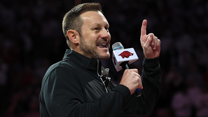 Arkansas Razorbacks new  coach Ryan Silverfield speaks to the crowd during halftime against the Louisville Cardinals at Bud Walton Arena.