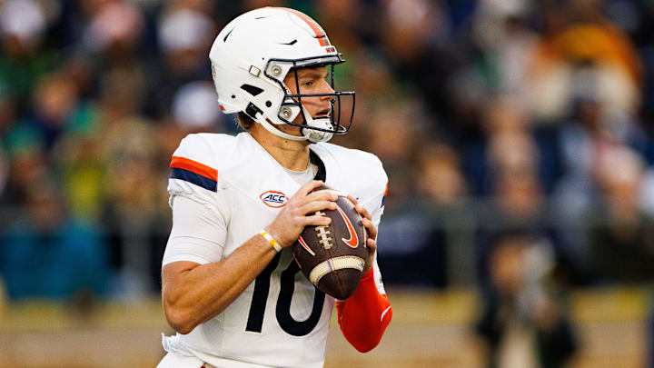 Virginia quarterback Anthony Colandrea (10) looks for an open receiver during a NCAA college football game against Notre Dame 