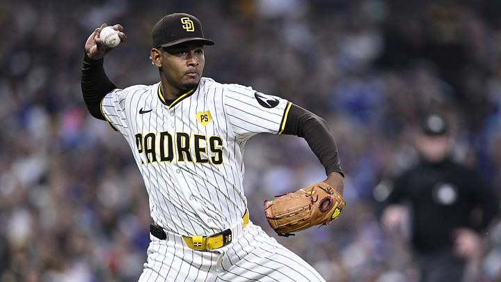 May 11, 2024; San Diego, California, USA; San Diego Padres relief pitcher Jhony Brito (76) throws to first base on a ground out by Los Angeles Dodgers designated hitter Shohei Ohtani (not pictured) during the seventh inning at Petco Park. Mandatory Credit: Orlando Ramirez-Imagn Images