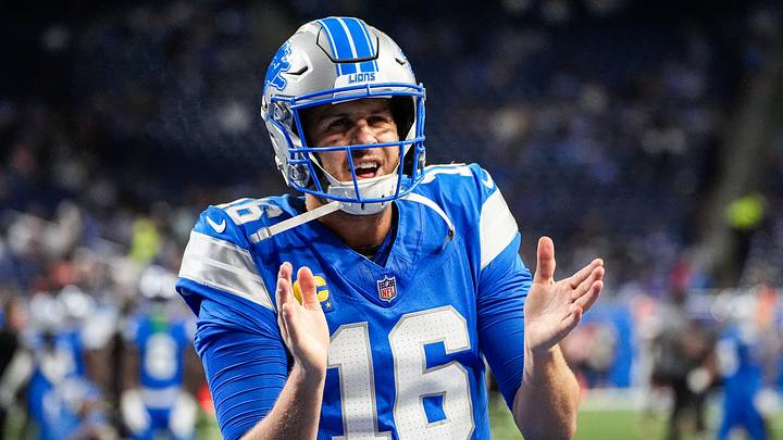 Detroit Lions quarterback Jared Goff claps during warmups