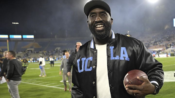 Nov 8, 2024; Pasadena, California, USA; UCLA Bruins head coach DeShaun Foster leaves the field with the game ball after defeating the Iowa Hawkeyes at the Rose Bowl. Mandatory Credit: Jayne Kamin-Oncea-Imagn Images Nov 8, 2024; Pasadena, California, USA; UCLA Bruins head coach DeShaun Foster leaves the field with the game ball after defeating the Iowa Hawkeyes at the Rose Bowl. Mandatory Credit: Jayne Kamin-Oncea-Imagn Images
