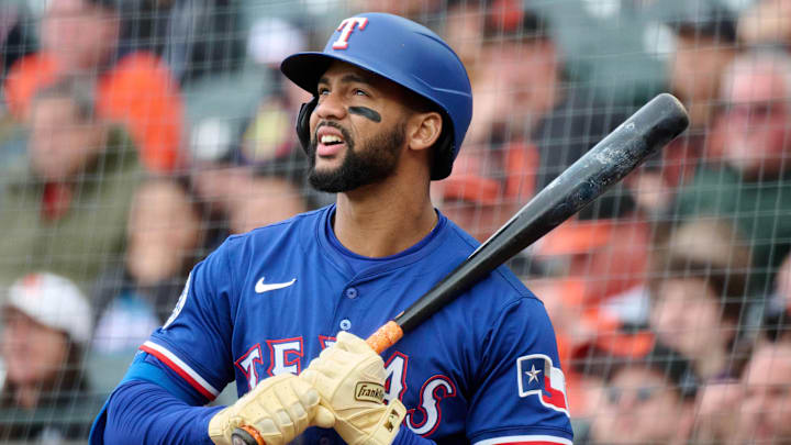 Apr 27, 2025; San Francisco, California, USA; Texas Rangers outfielder Leody Taveras (3) looks on in the on-deck circle against the San Francisco Giants during the seventh inning at Oracle Park. Mandatory Credit: Robert Edwards-Imagn Images