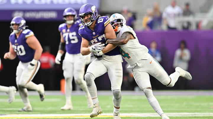 Minnesota Vikings tight end T.J. Hockenson (87) is tackled by Miami Dolphins cornerback Jason Marshall Jr. (4) during the fourth quarter at U.S. Bank Stadium. Minnesota Vikings tight end T.J. Hockenson (87) is tackled by Miami Dolphins cornerback Jason Marshall Jr. (4) during the fourth quarter at U.S. Bank Stadium.