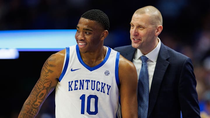 Dec 31, 2024; Lexington, Kentucky, USA; Kentucky Wildcats head coach Mark Pope talks with forward Brandon Garrison (10) during the second half against the Brown Bears at Rupp Arena at Central Bank Center. Mandatory Credit: Jordan Prather-Imagn Images