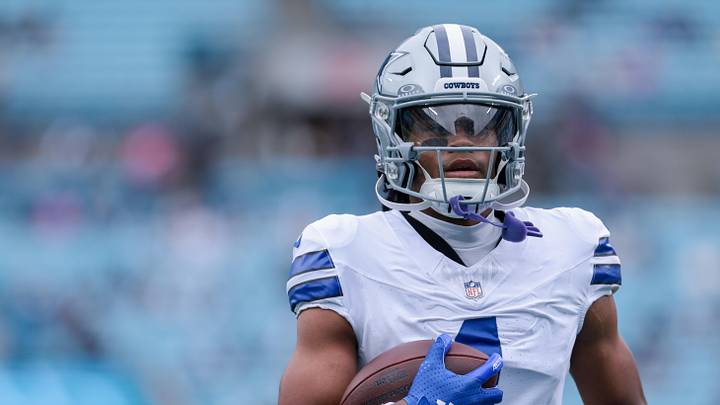 Former Dallas Cowboys wide receiver Jalen Tolbert (1) warms up before the game against the Carolina Panthers at Bank of America Stadium. 