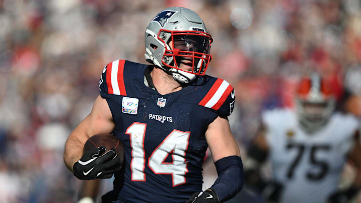 Oct 26, 2025; Foxborough, Massachusetts, USA;  New England Patriots linebacker Robert Spillane (14) runs the ball during the third quarter against the Cleveland Browns at Gillette Stadium. Mandatory Credit: Brian Fluharty-Imagn Images
