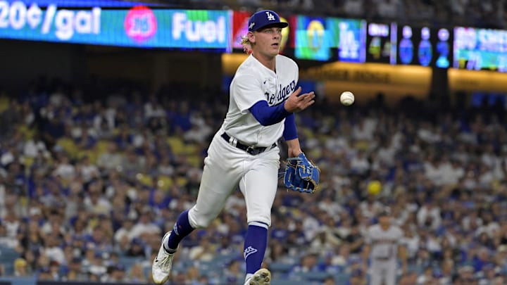 Oct 7, 2023; Los Angeles, California, USA; Los Angeles Dodgers starting pitcher Emmet Sheehan (80) makes a throw to first base against the Arizona Diamondbacks during the third inning for game one of the NLDS for the 2023 MLB playoffs at Dodger Stadium. Mandatory Credit: Jayne Kamin-Oncea-Imagn Images