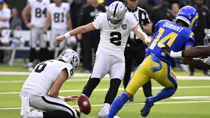 Oct 20, 2024; Inglewood, California, USA; Las Vegas Raiders place kicker Daniel Carlson (2) kicks a second field goal against the Los Angeles Rams in the first half at SoFi Stadium. Mandatory Credit: Alex Gallardo-Imagn Images
