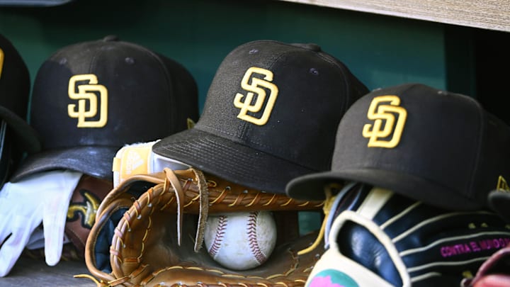 May 24, 2023; Washington, District of Columbia, USA; San Diego Padres hats in the dugout during the game against the Washington Nationals at Nationals Park. Mandatory Credit: Brad Mills-Imagn Images May 24, 2023; Washington, District of Columbia, USA; San Diego Padres hats in the dugout during the game against the Washington Nationals at Nationals Park. Mandatory Credit: Brad Mills-Imagn Images